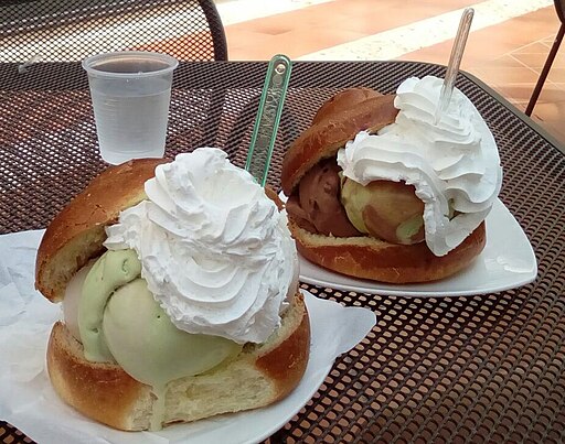 Traditional Sicilian breakfast: granita and brioche col tuppo